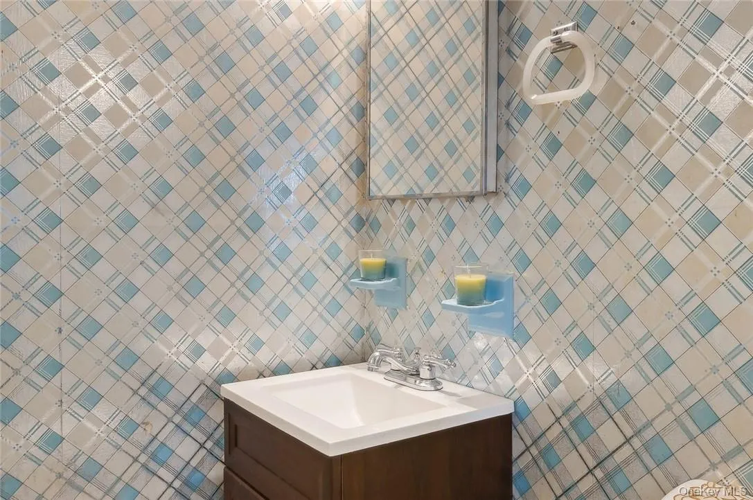 Bathroom featuring vanity Bathroom featuring vanity