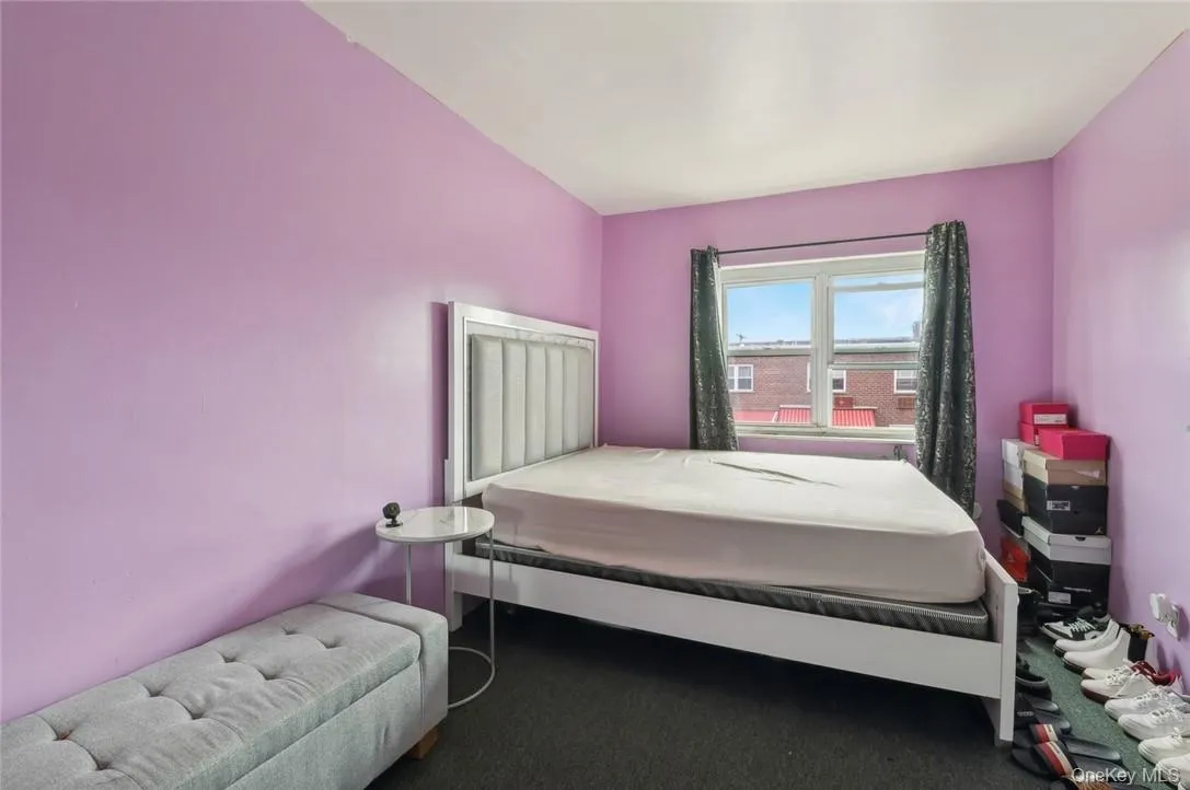 Bedroom with dark carpet Bedroom with dark carpet