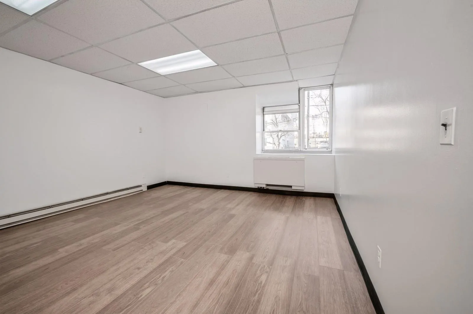 Office # 2: Spacious, lots of natural light, access to large storage room Office # 2: Spacious, lots of natural light, access to large storage room