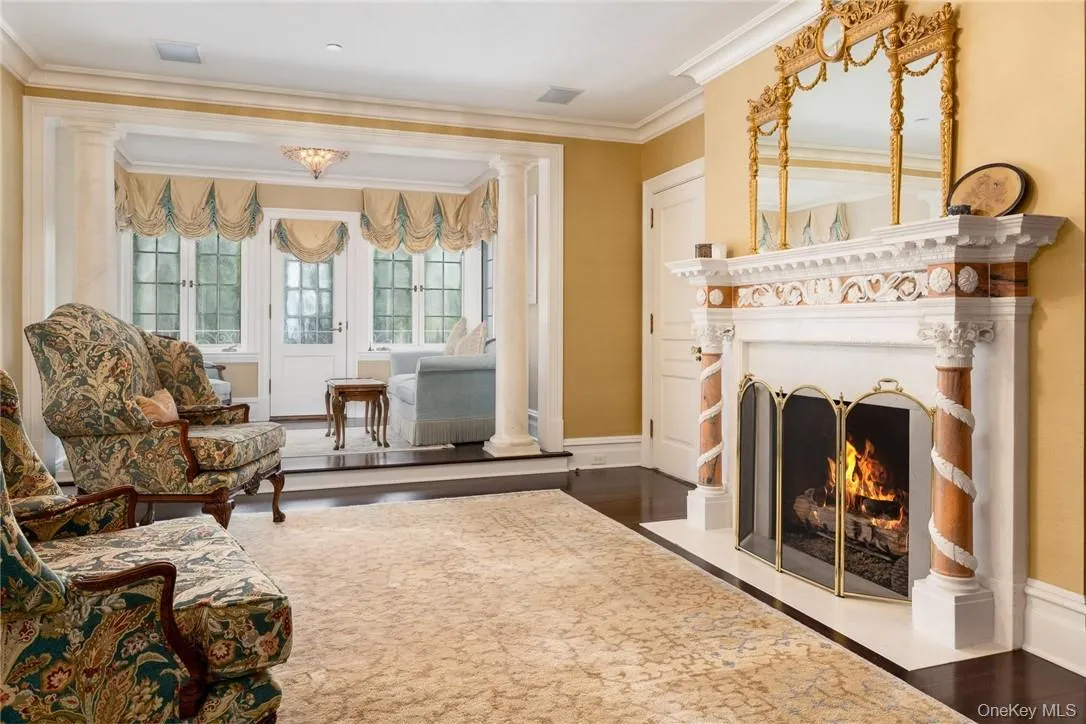 Primary Bedroom Sitting Room with fireplace and additional sitting area to balcony Primary Bedroom Sitting Room with fireplace and additional sitting area to balcony