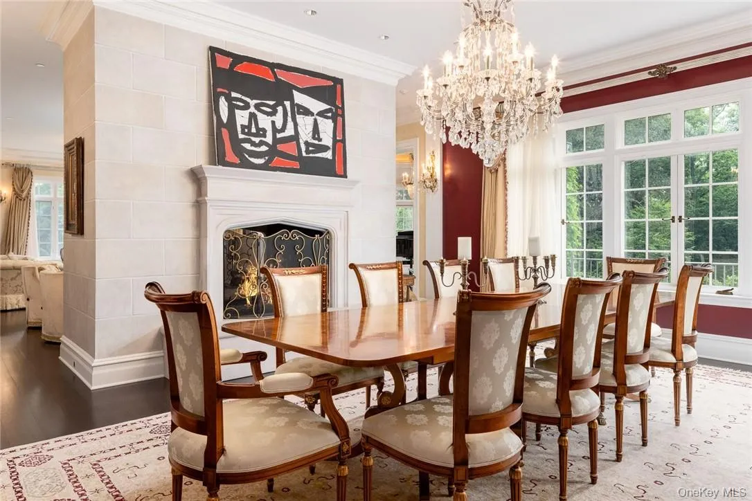 Formal Dining room with venetian plaster walls and double-sided fireplace Formal Dining room with venetian plaster walls and double-sided fireplace