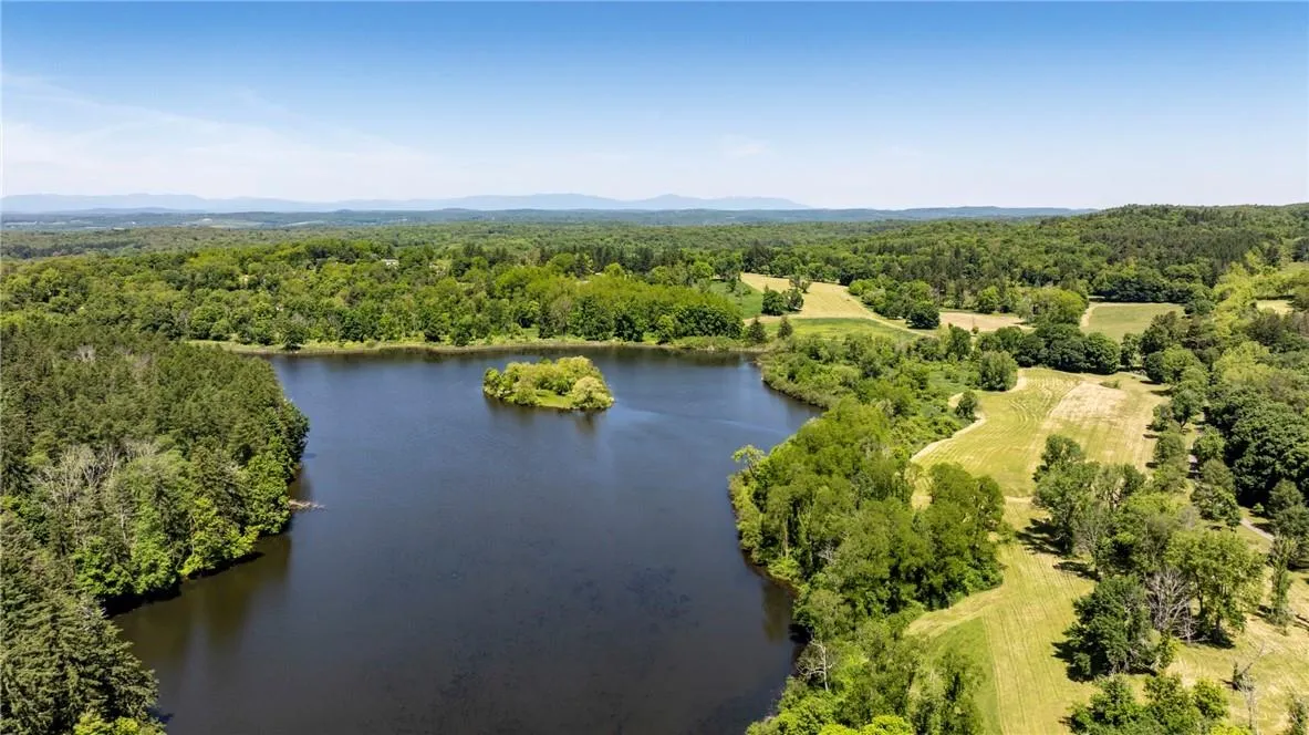 Birds eye view of property featuring a water view Birds eye view of property featuring a water view