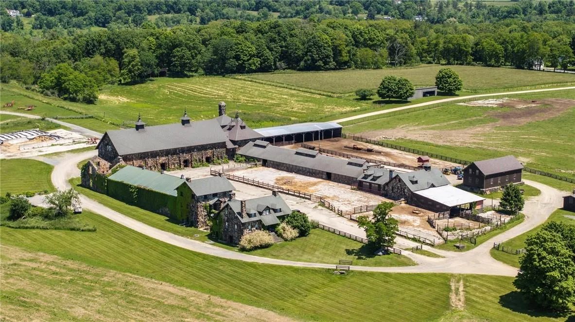Aerial view featuring a rural view Aerial view featuring a rural view