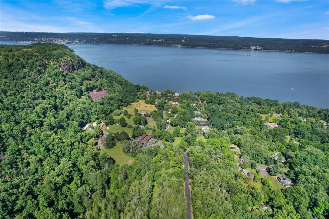 Bird's eye view featuring a water view Bird's eye view featuring a water view