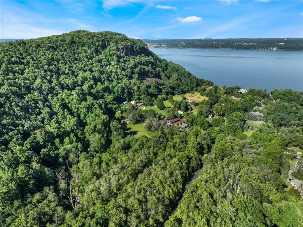 Aerial view featuring a water view Aerial view featuring a water view