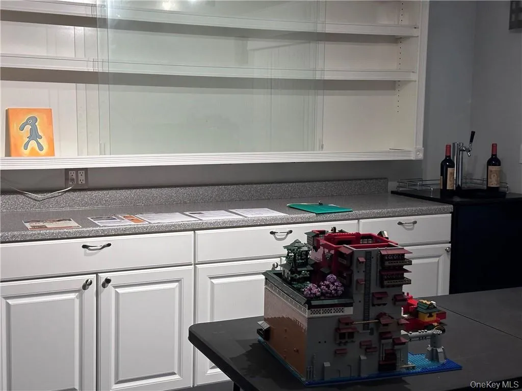 Possible 2nd bedroom with built in cabinets & large walk in closet Possible 2nd bedroom with built in cabinets & large walk in closet