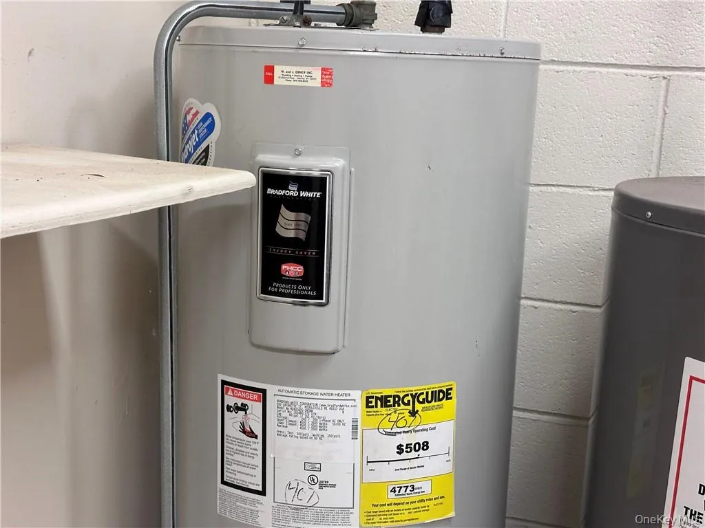 Utilities featuring water heater Utilities featuring water heater