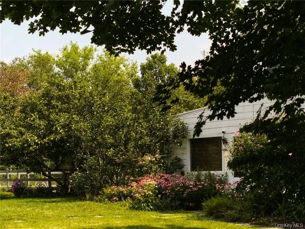 View of side of property with a lawn View of side of property with a lawn