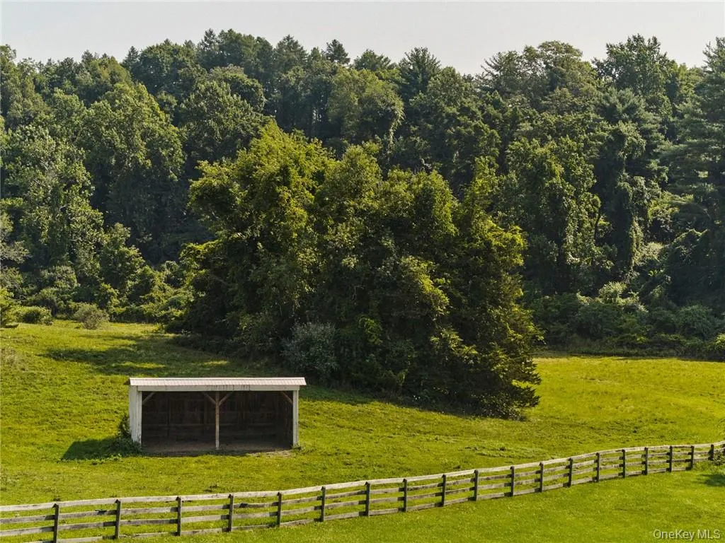 Surrounding community with a yard, a rural view, and an outbuilding Surrounding community with a yard, a rural view, and an outbuilding