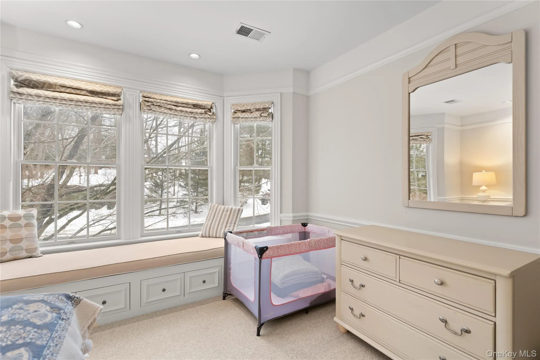 Bedroom with light carpet and recessed lighting Bedroom with light carpet and recessed lighting