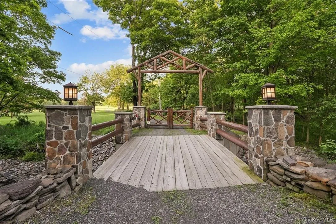 Custom, newly rebuilt private bridge with gate Custom, newly rebuilt private bridge with gate