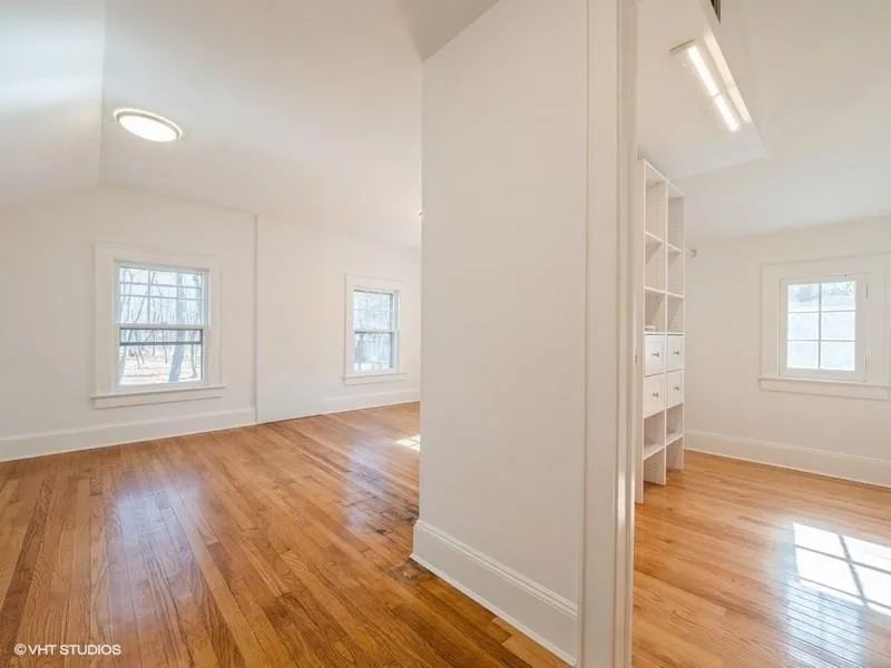 Primary bedroom with walk-in closet. Primary bedroom with walk-in closet.