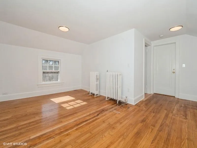 Upstairs you will find a spacious primary bedroom. Upstairs you will find a spacious primary bedroom.