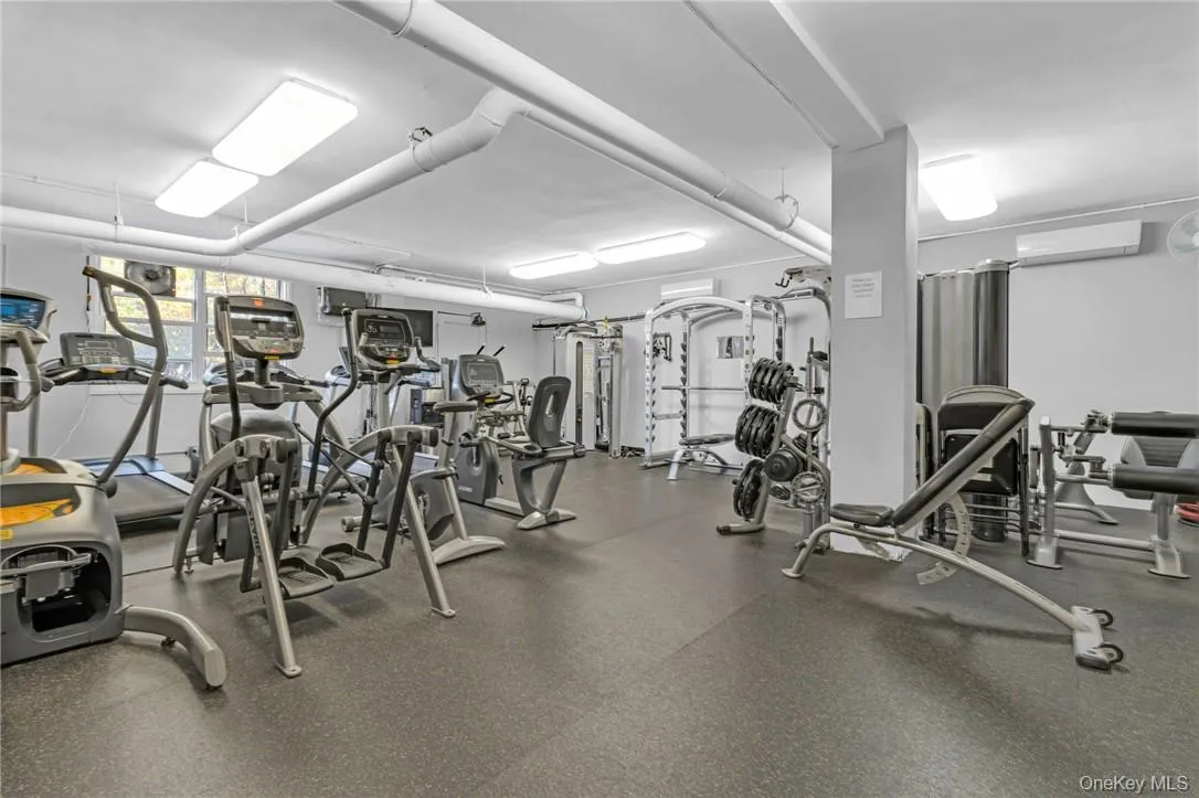 Exercise room with a wall mounted AC Exercise room with a wall mounted AC