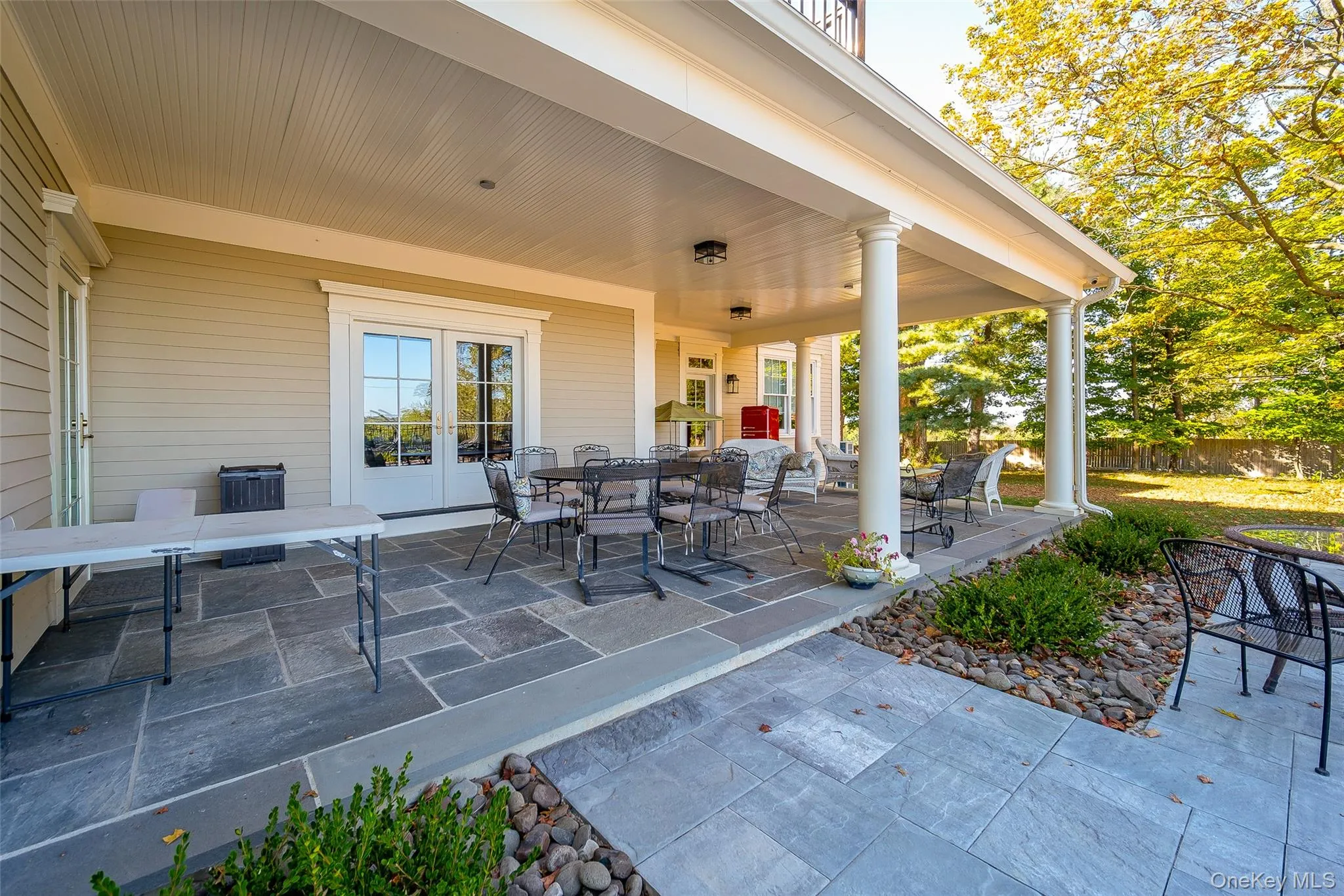 View of patio / terrace with outdoor dining space and french doors View of patio / terrace with outdoor dining space and french doors