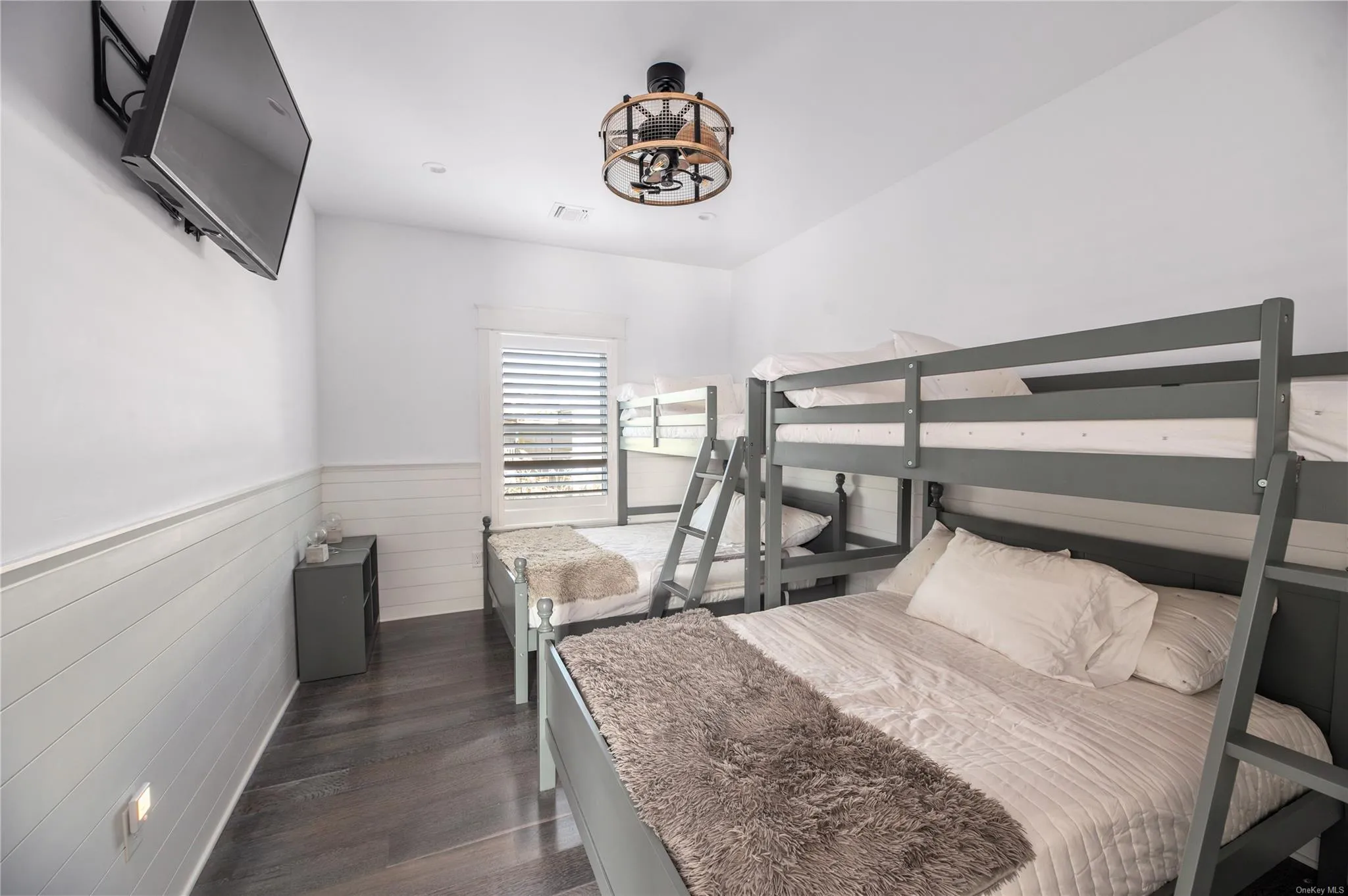 Bedroom with dark wood-type flooring Bedroom with dark wood-type flooring