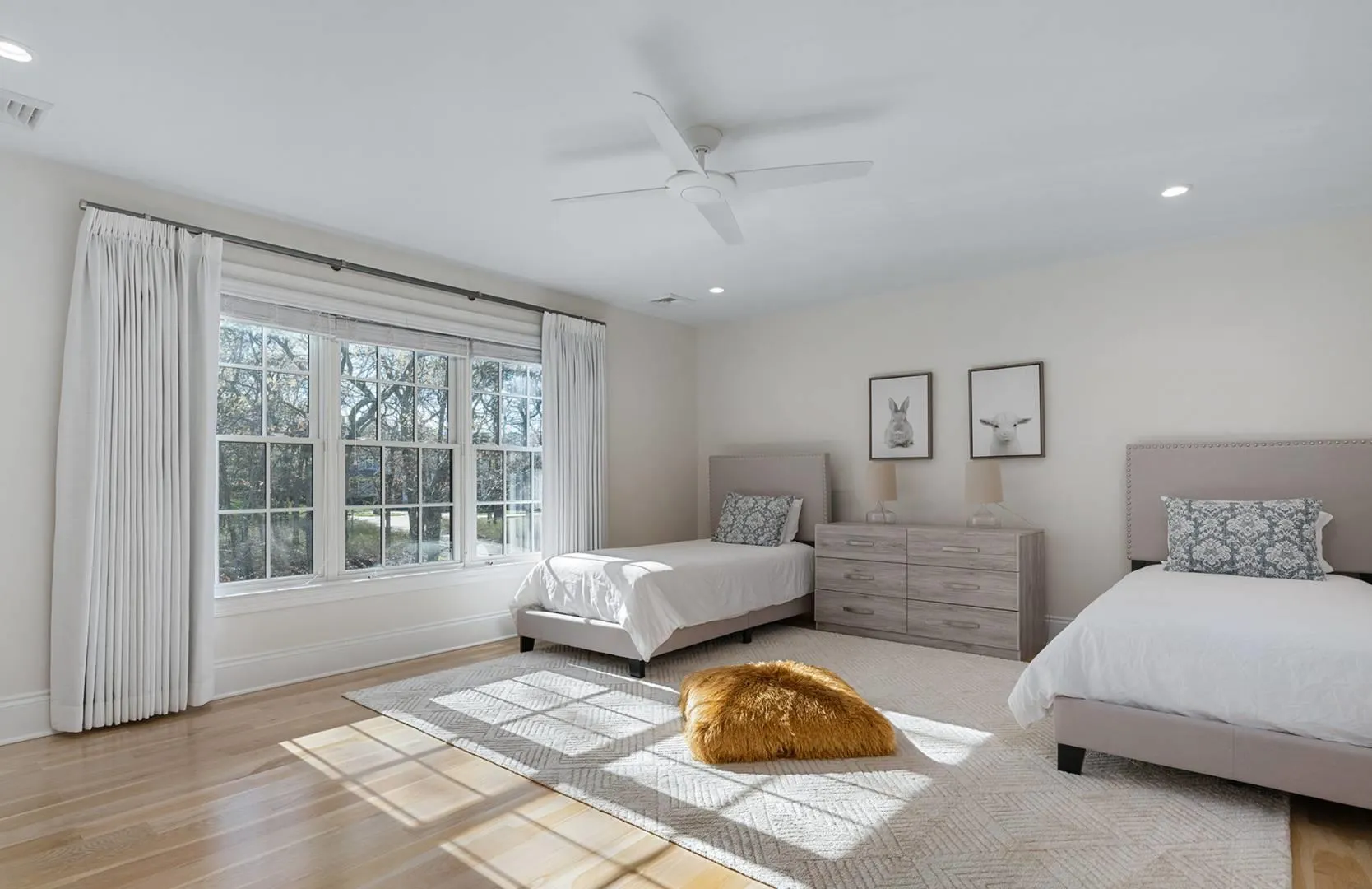 Bedroom featuring light wood-style flooring, recessed lighting, and ceiling fan Bedroom featuring light wood-style flooring, recessed lighting, and ceiling fan