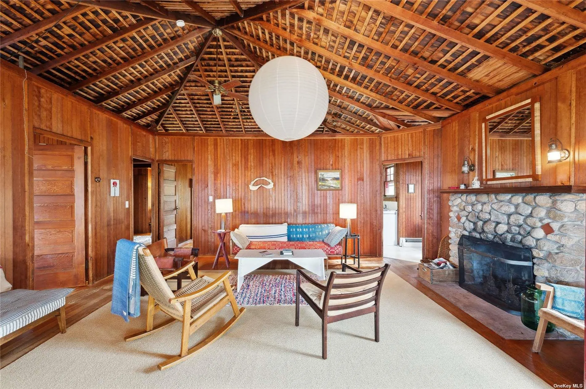 Living Room with Fireplace & Water Views Living Room with Fireplace & Water Views