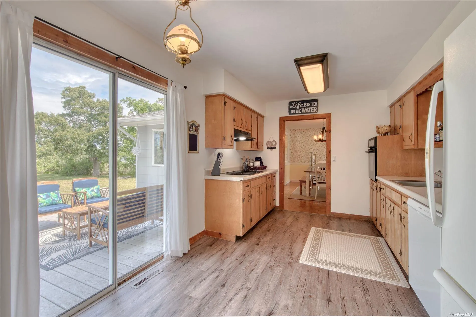 Kitchen with Sliders to Back Deck Kitchen with Sliders to Back Deck