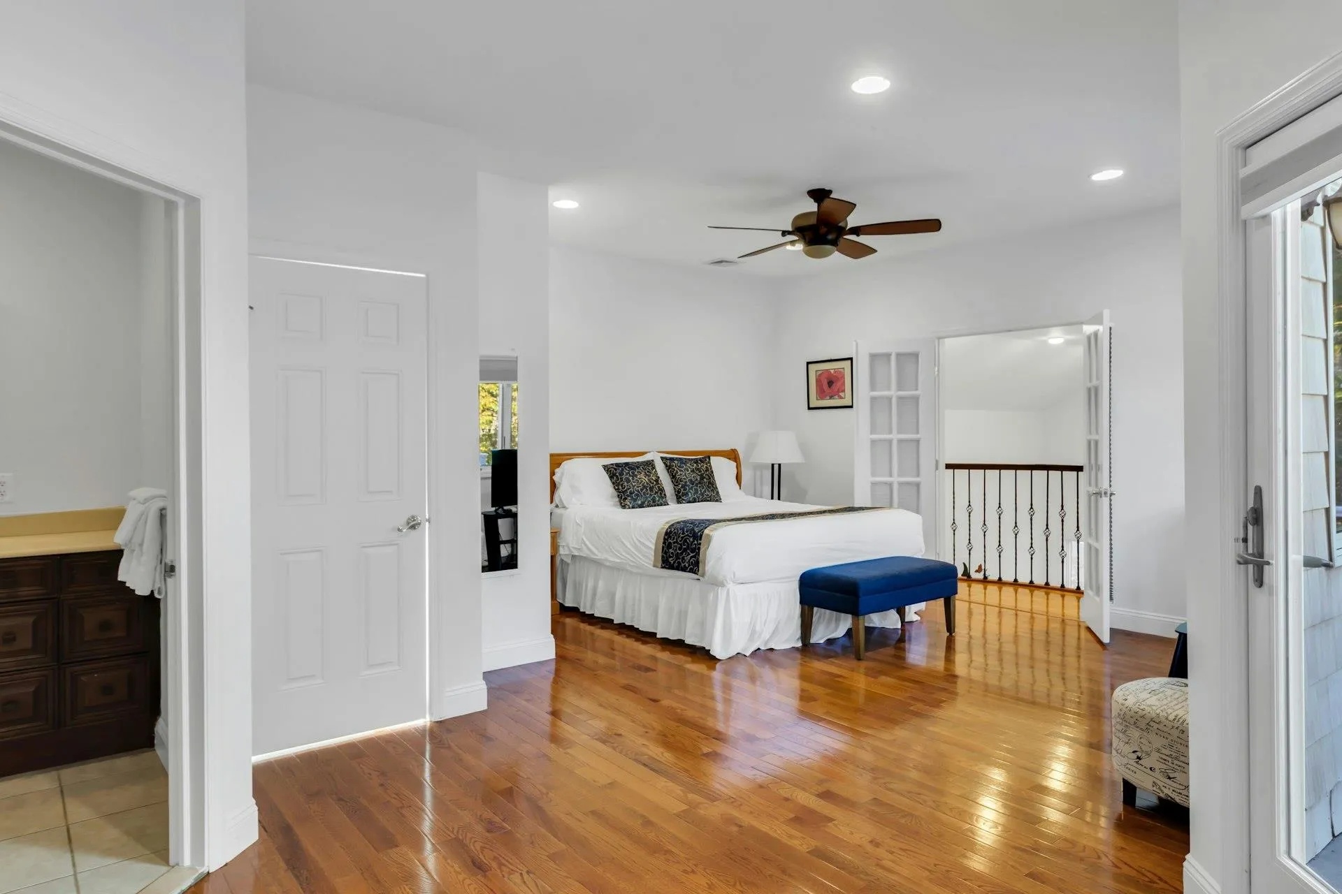Bedroom with light wood-style floors, recessed lighting, and ceiling fan Bedroom with light wood-style floors, recessed lighting, and ceiling fan