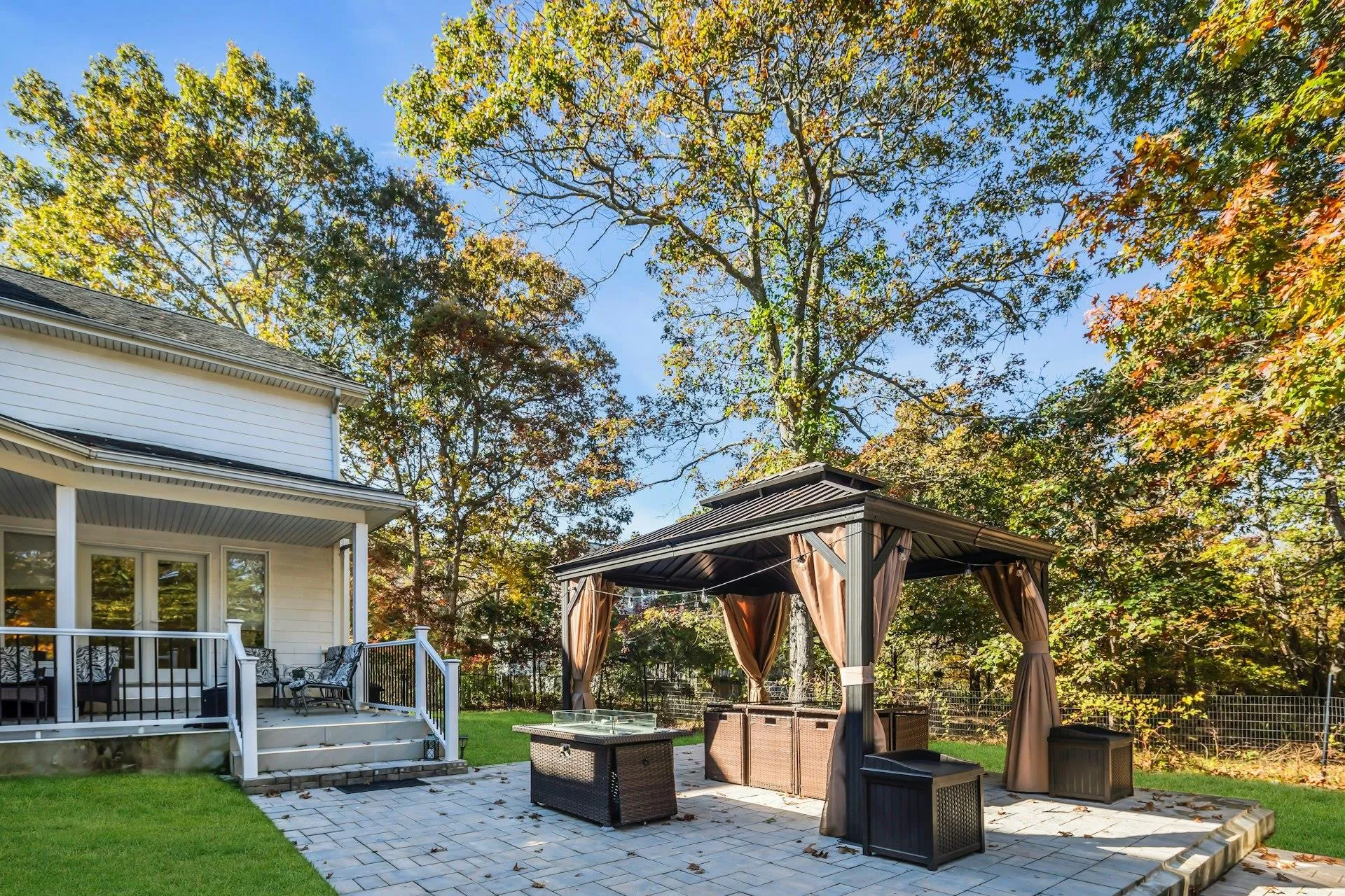 View of patio / terrace with a gazebo and a fire pit View of patio / terrace with a gazebo and a fire pit