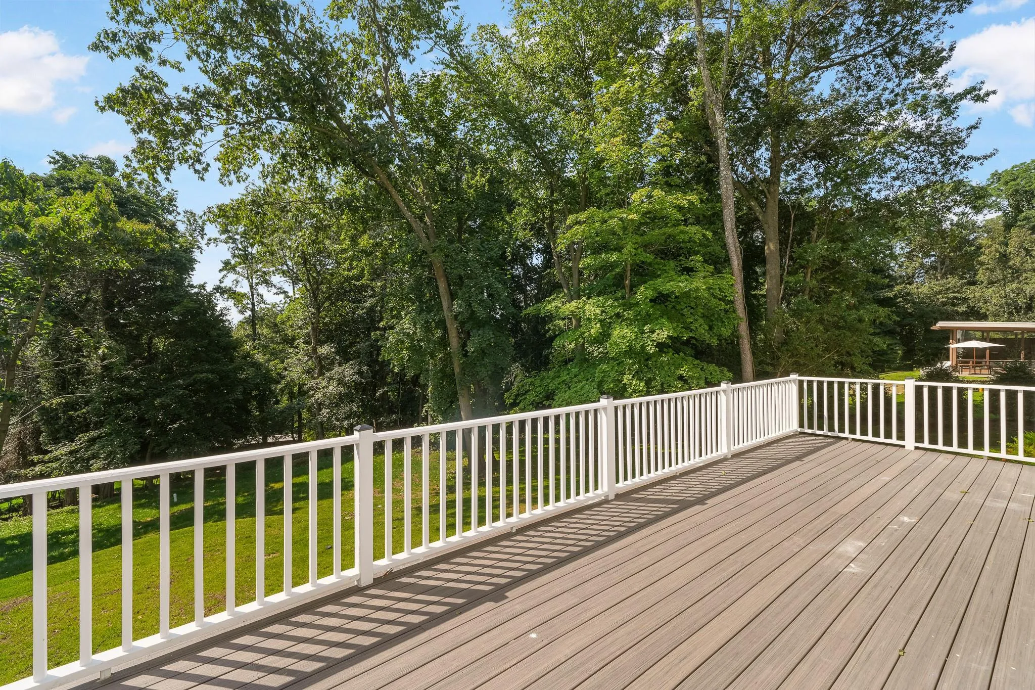 Deck featuring a yard Deck featuring a yard