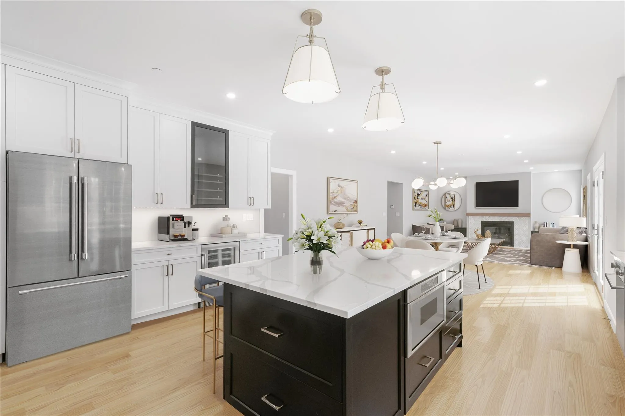 Kitchen with white cabinetry, wine cooler, a center island, stainless steel appliances, and light hardwood / wood-style flooring Kitchen with white cabinetry, wine cooler, a center island, stainless steel appliances, and light hardwood / wood-style flooring