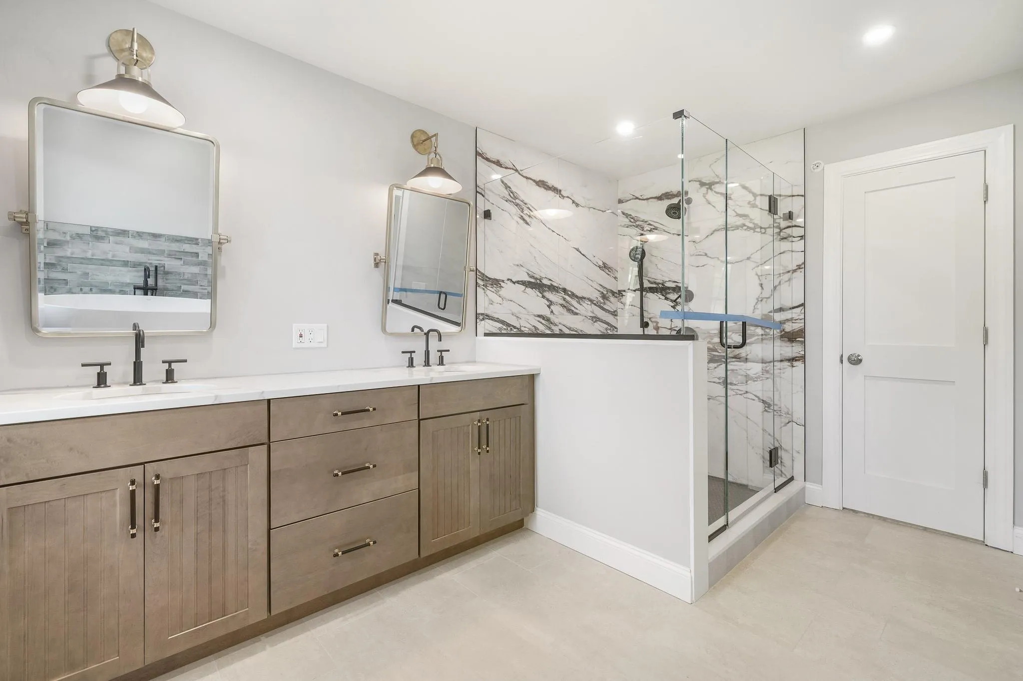 Bathroom with an enclosed shower and vanity Bathroom with an enclosed shower and vanity