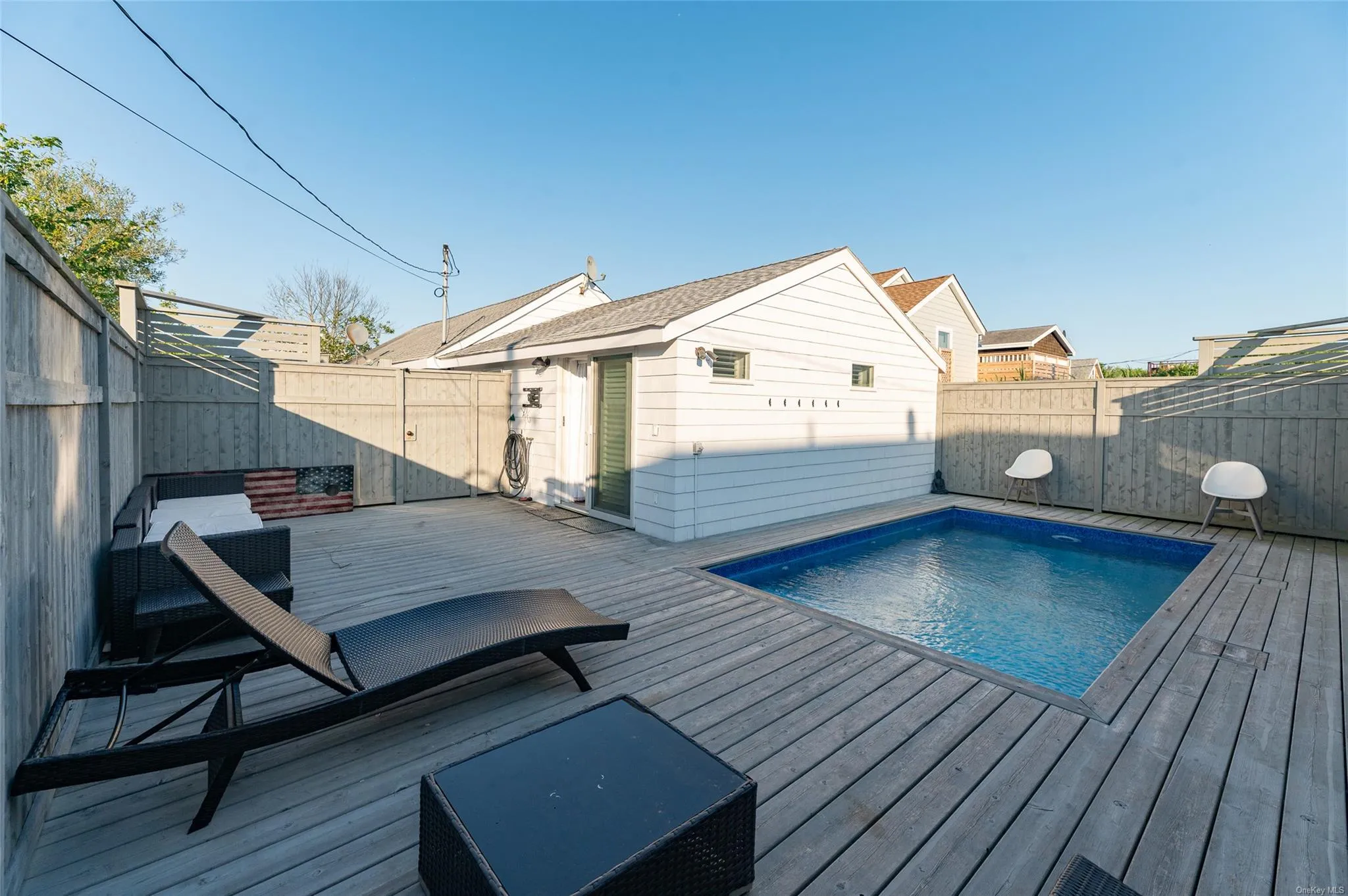 View of pool featuring a deck View of pool featuring a deck