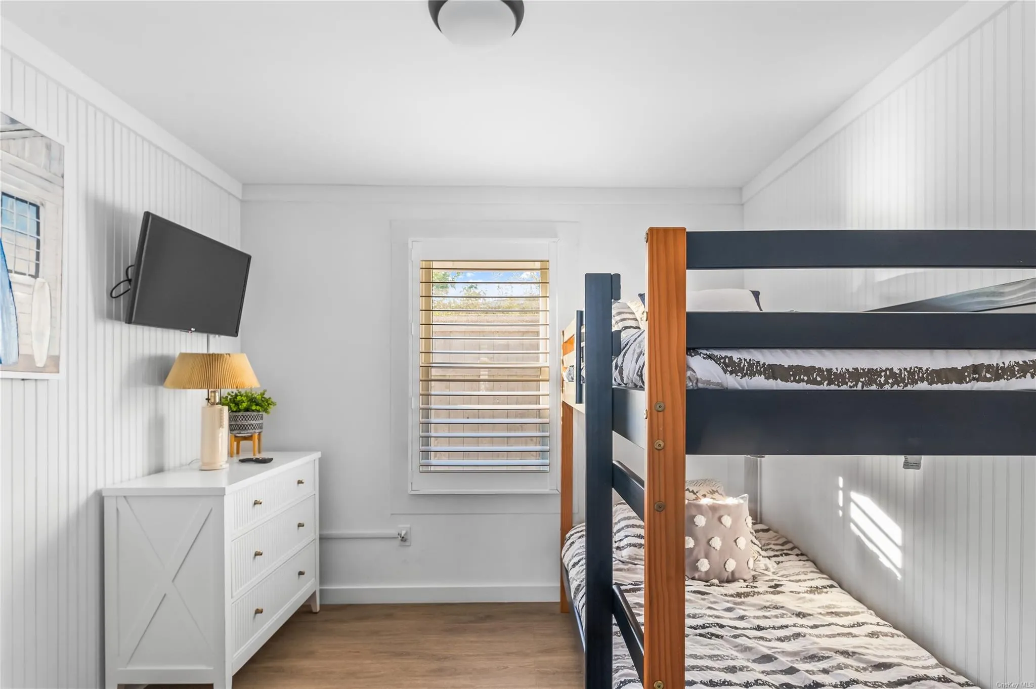 Bedroom with light wood-type flooring Bedroom with light wood-type flooring