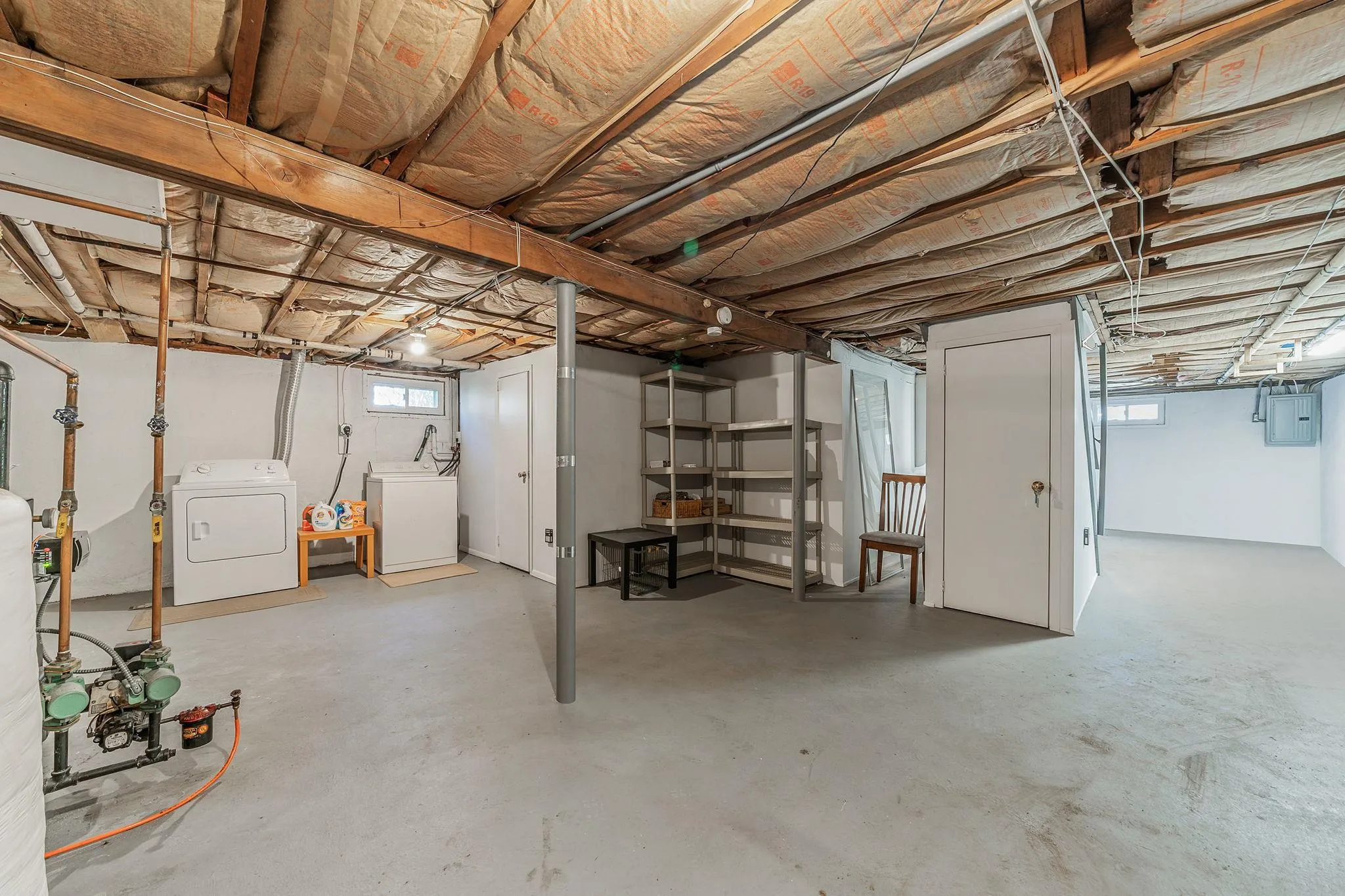 Basement with separate washer and dryer and electric panel Basement with separate washer and dryer and electric panel