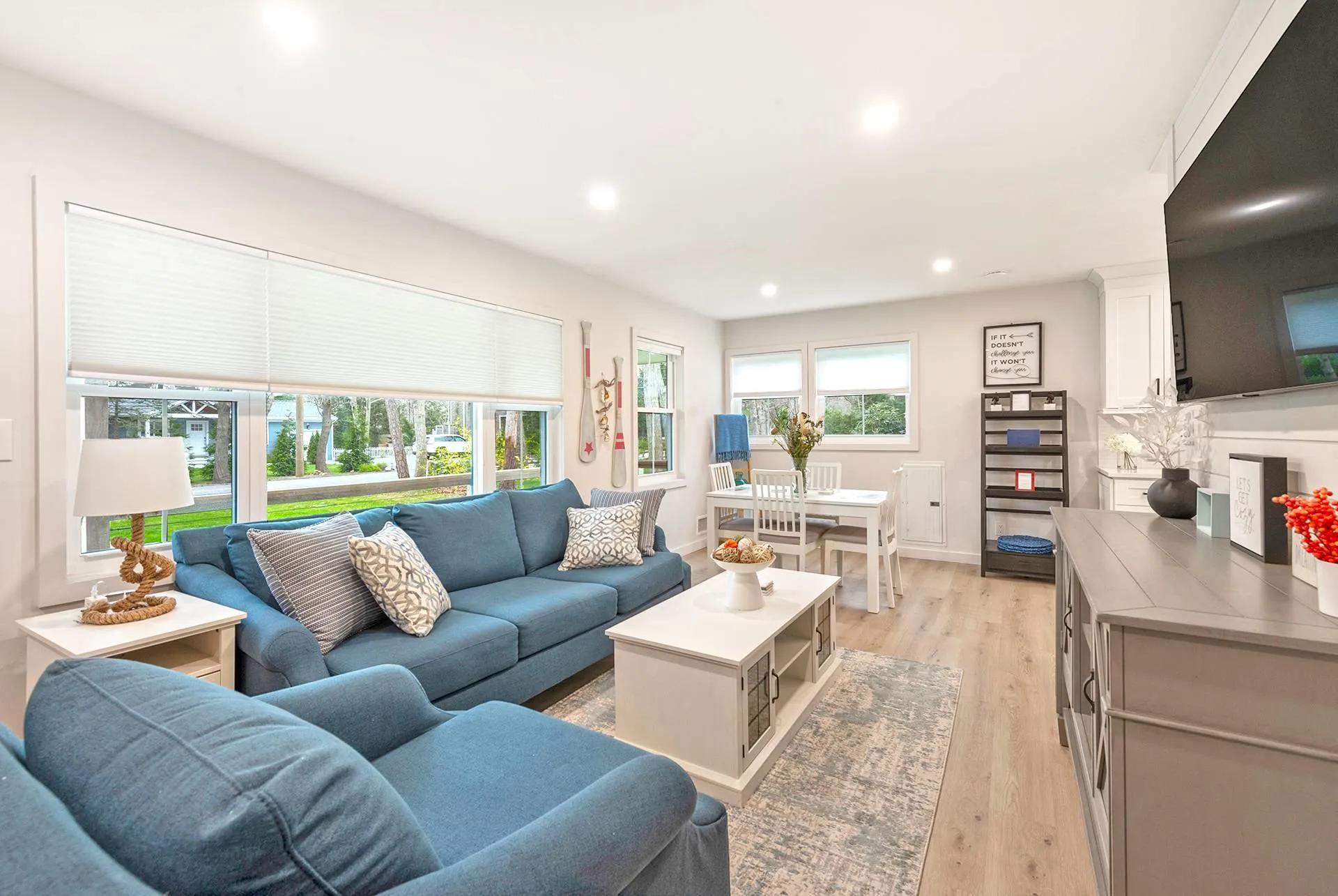 Living area featuring recessed lighting and light wood-style floors Living area featuring recessed lighting and light wood-style floors