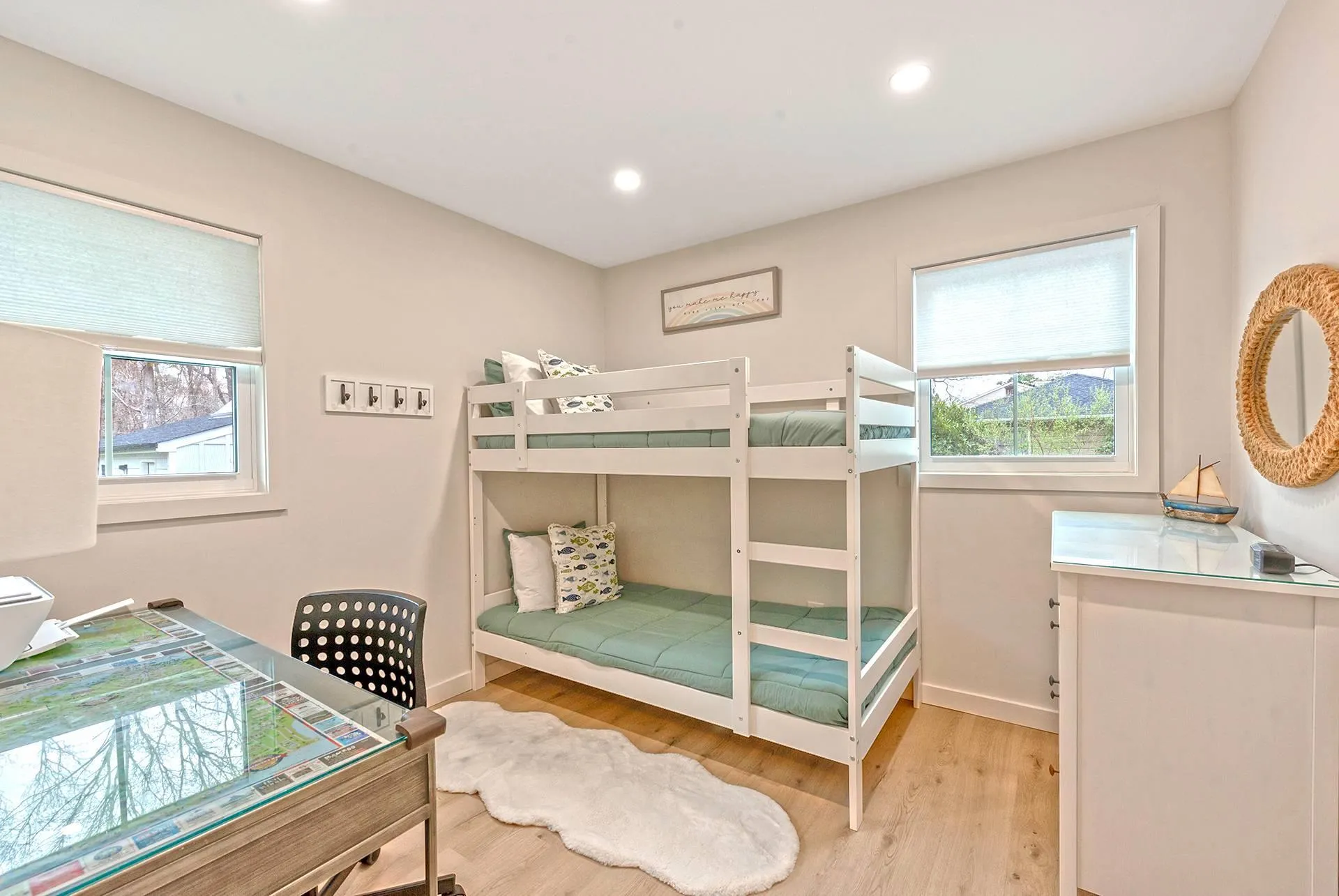Bedroom with wood finished floors, recessed lighting, and baseboards Bedroom with wood finished floors, recessed lighting, and baseboards