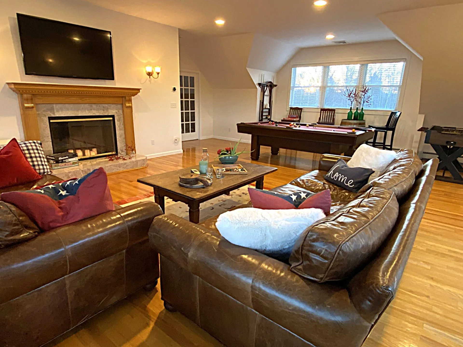 2nd floor Living room with fireplace, media/game area, billiards, foosball & sliders to deck! 2nd floor Living room with fireplace, media/game area, billiards, foosball & sliders to deck!