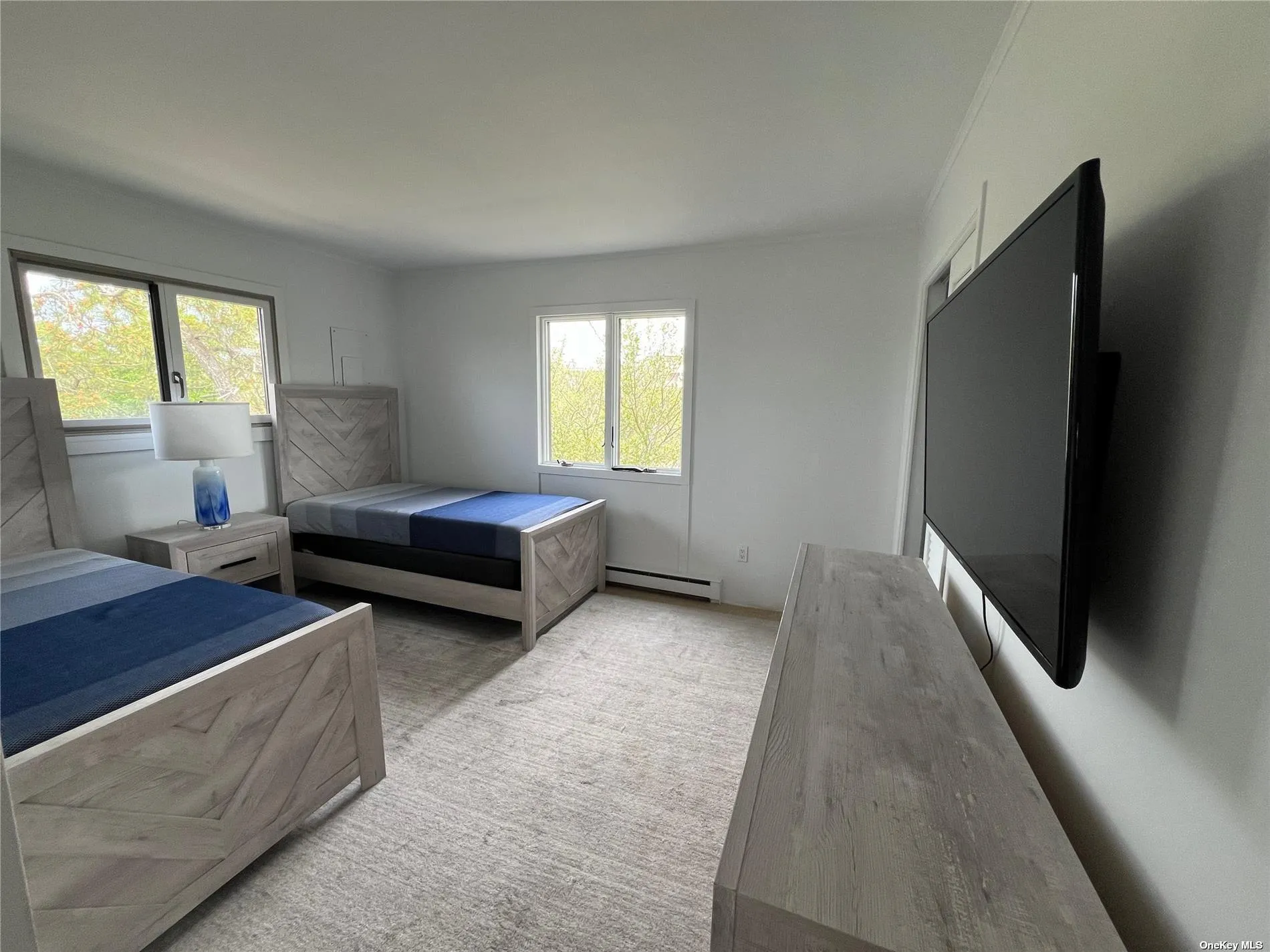 One of two First floor guest rooms with large flat screen ac & two twin beds One of two First floor guest rooms with large flat screen ac & two twin beds