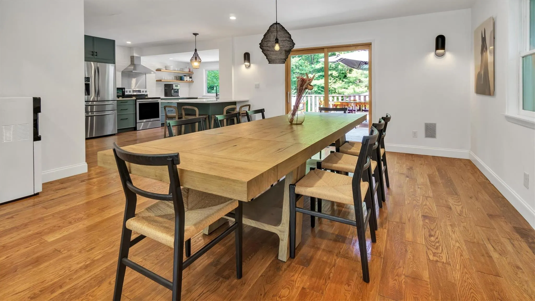 Dining area featuring light wood finished floors and recessed lighting Dining area featuring light wood finished floors and recessed lighting