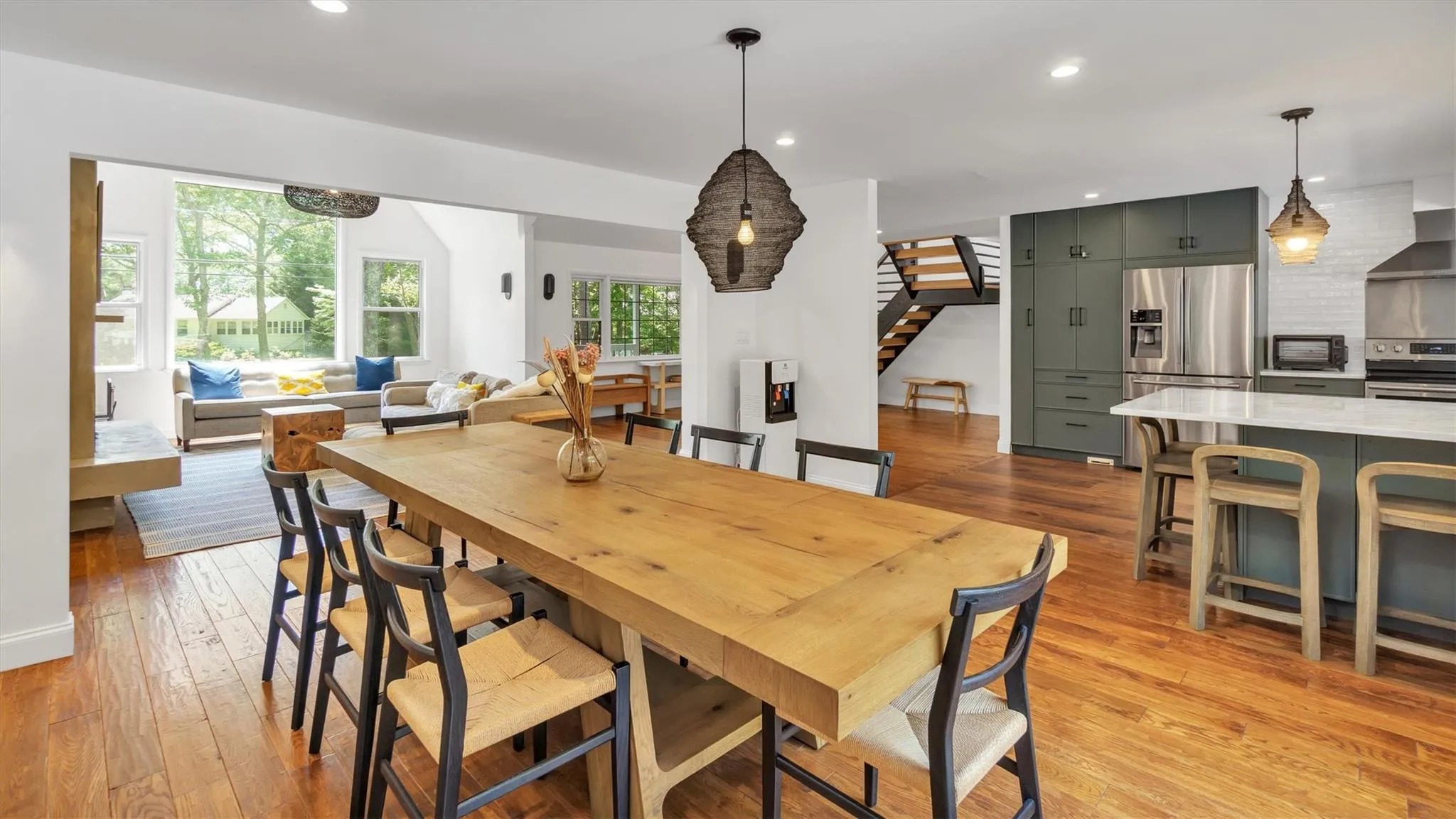 Dining room with light wood-style floors, and recessed lighting Dining room with light wood-style floors, and recessed lighting