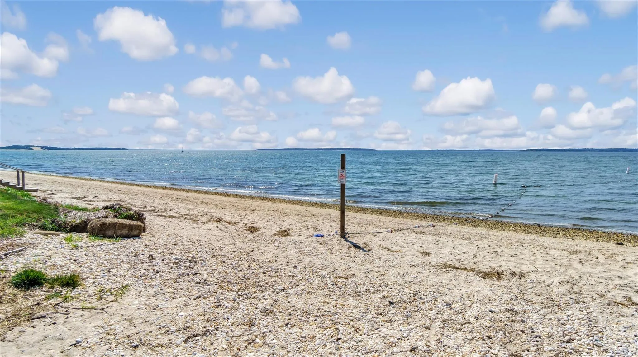 Water view featuring private bay beach. Water view featuring private bay beach.