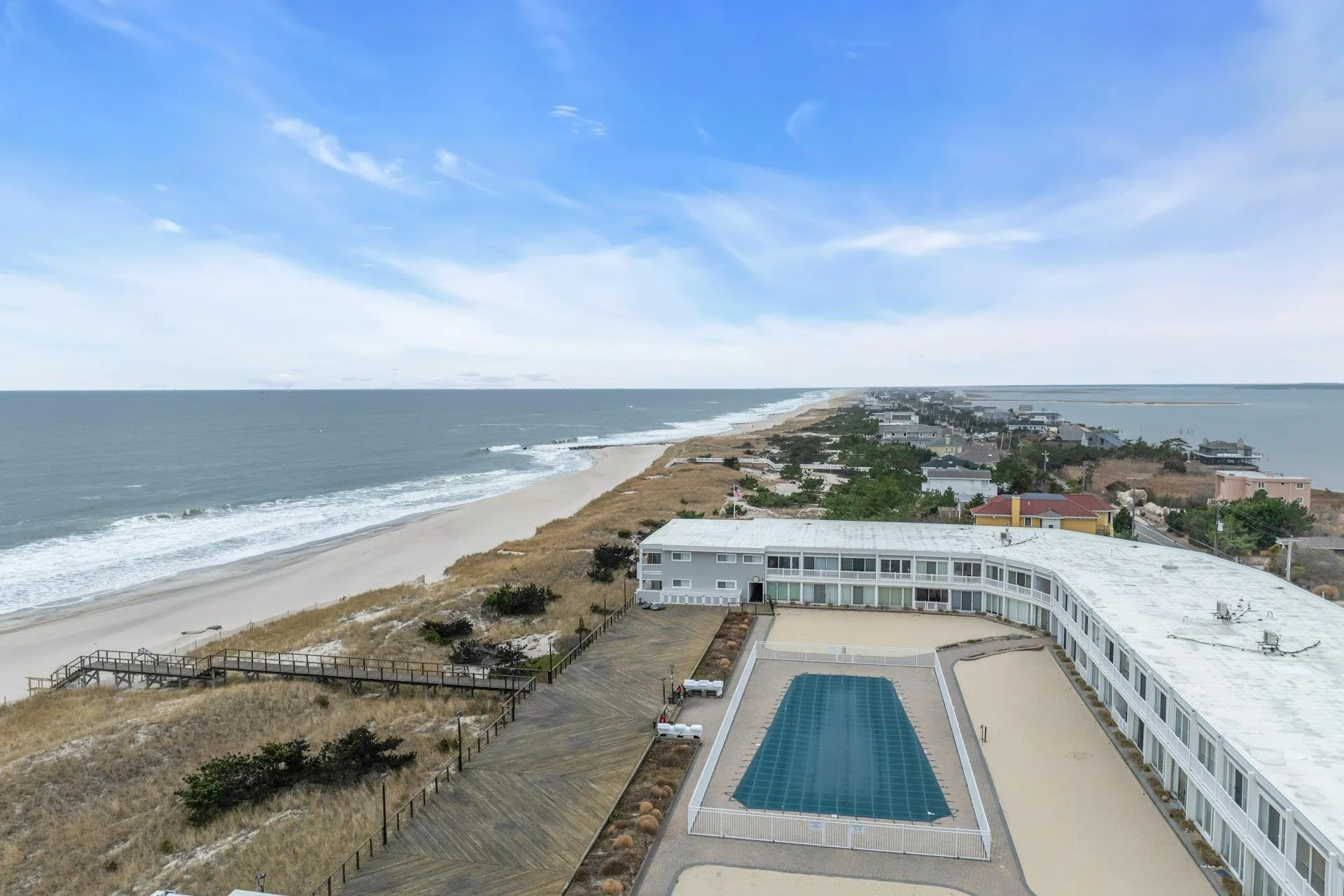 Aerial view with a water view and a view of the beach Aerial view with a water view and a view of the beach