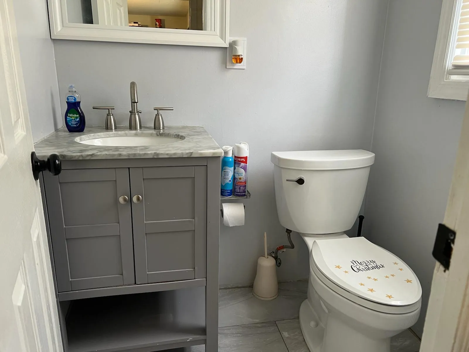 Half bathroom with vanity and toilet Half bathroom with vanity and toilet