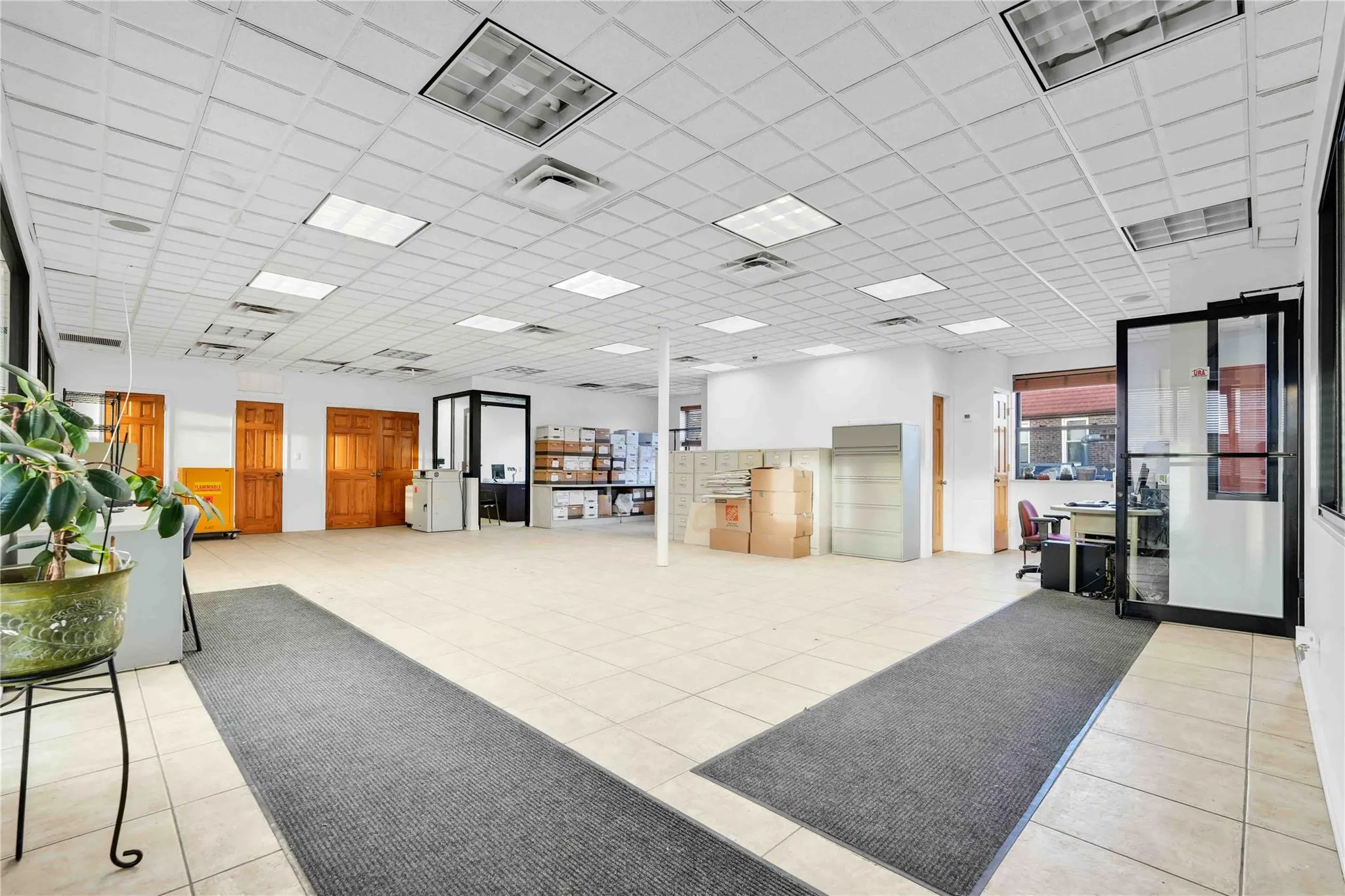 Community lobby with a paneled ceiling Community lobby with a paneled ceiling