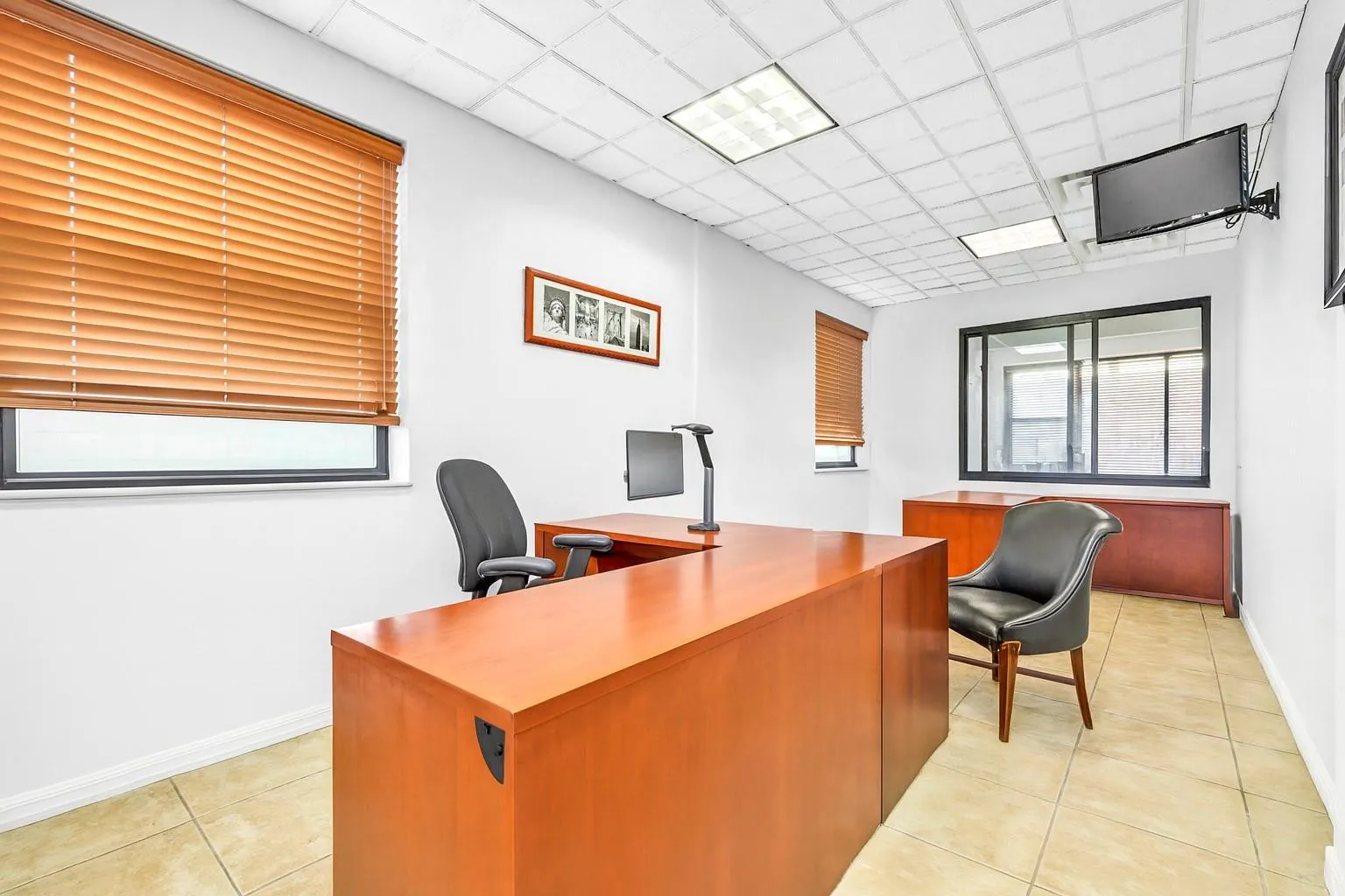 Office area featuring a paneled ceiling Office area featuring a paneled ceiling