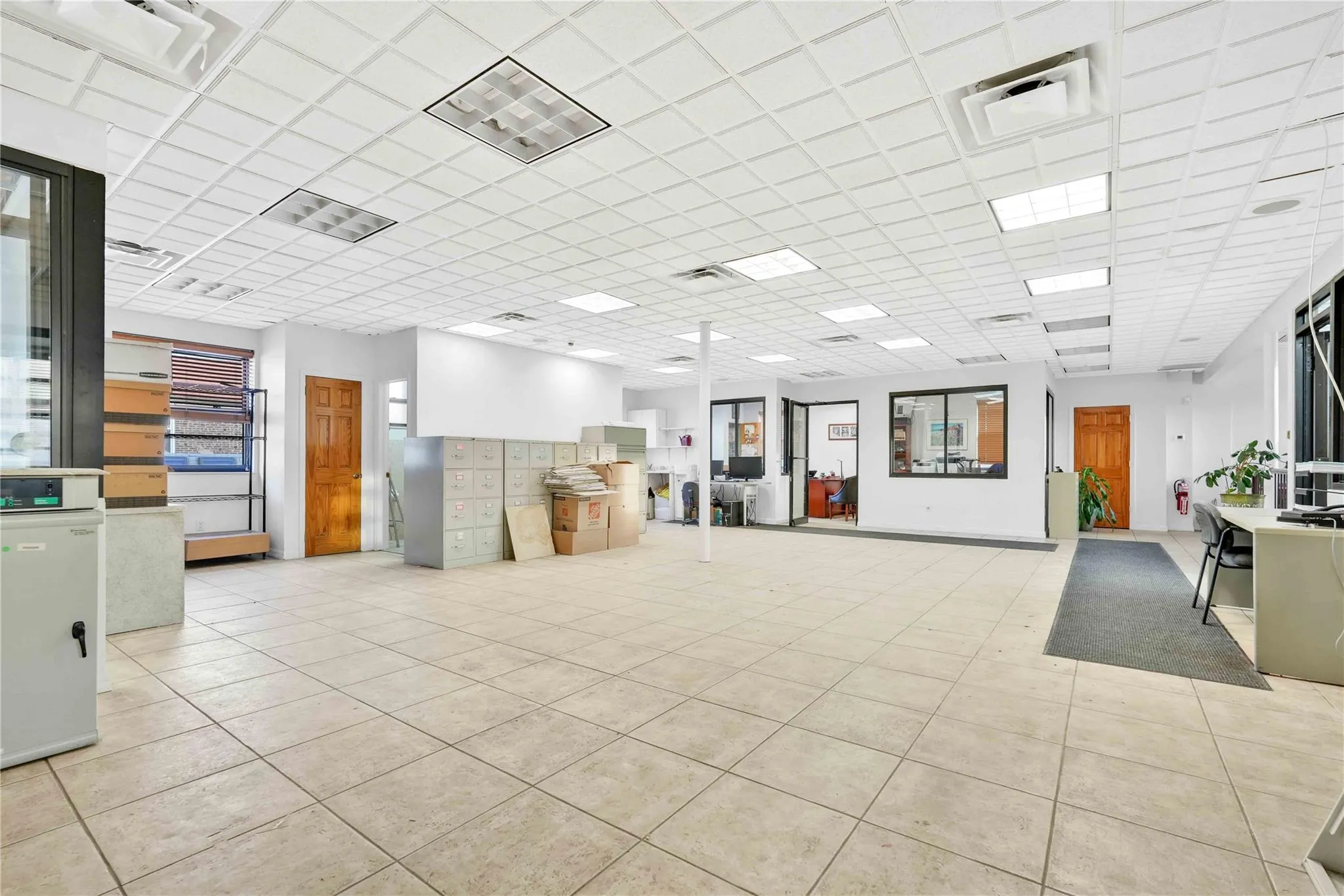 Lobby featuring a paneled ceiling Lobby featuring a paneled ceiling
