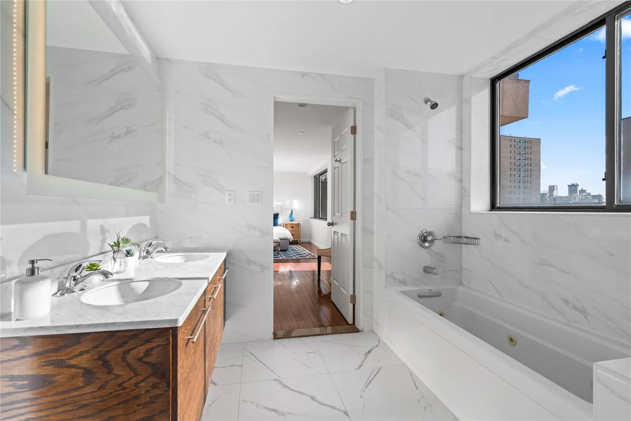 Bathroom with vanity and tiled shower / bath Bathroom with vanity and tiled shower / bath