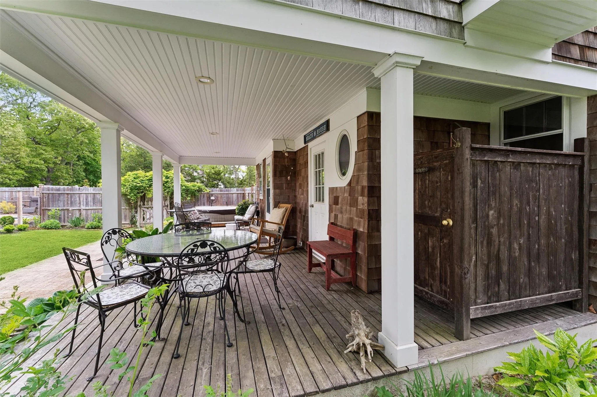 Wooden deck featuring outdoor dining area Wooden deck featuring outdoor dining area