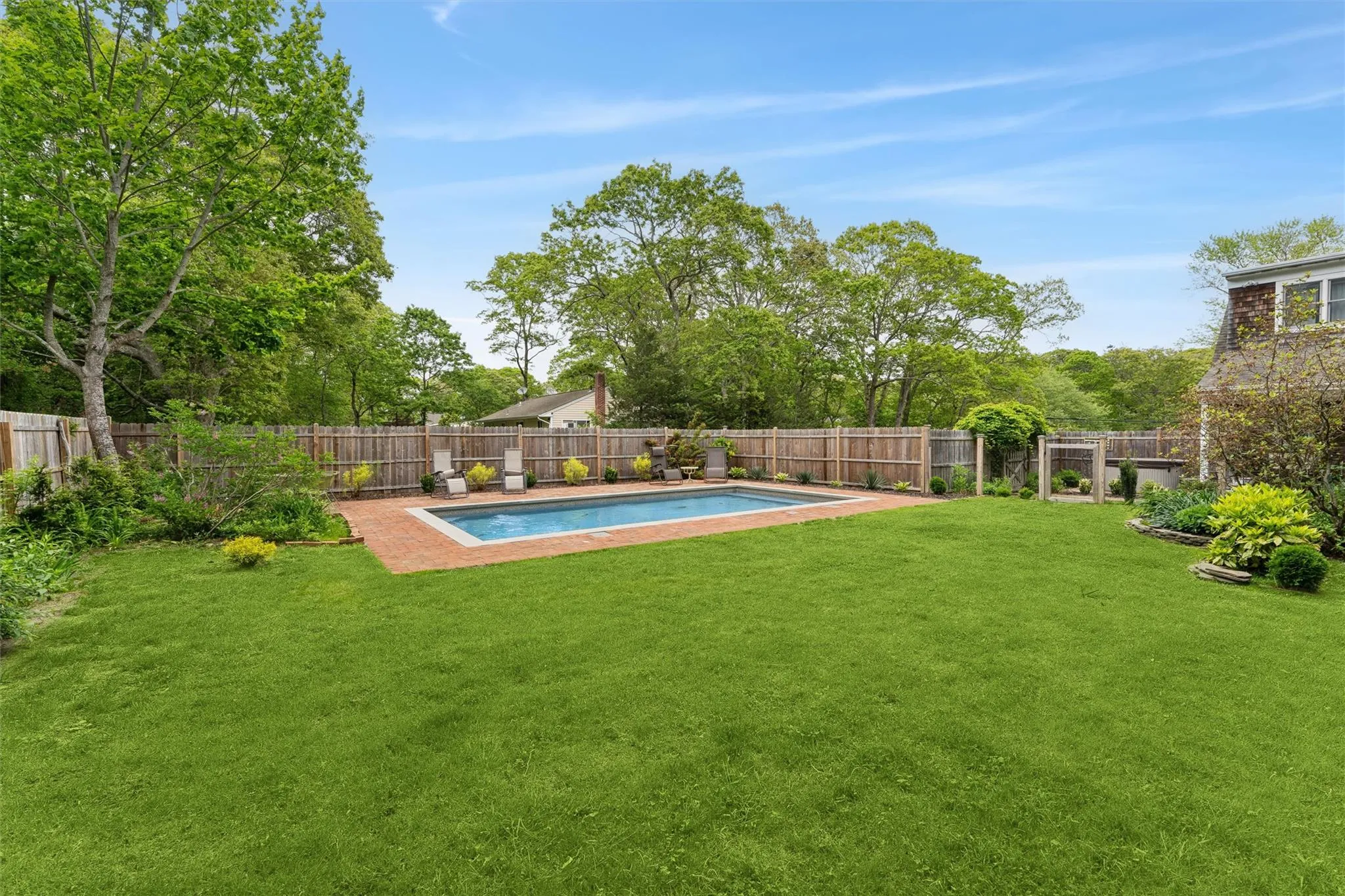 View of pool featuring a fenced backyard View of pool featuring a fenced backyard