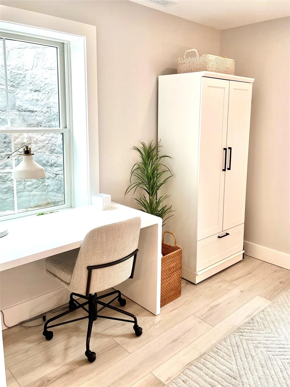 Office space featuring a wealth of natural light and light wood-type flooring Office space featuring a wealth of natural light and light wood-type flooring