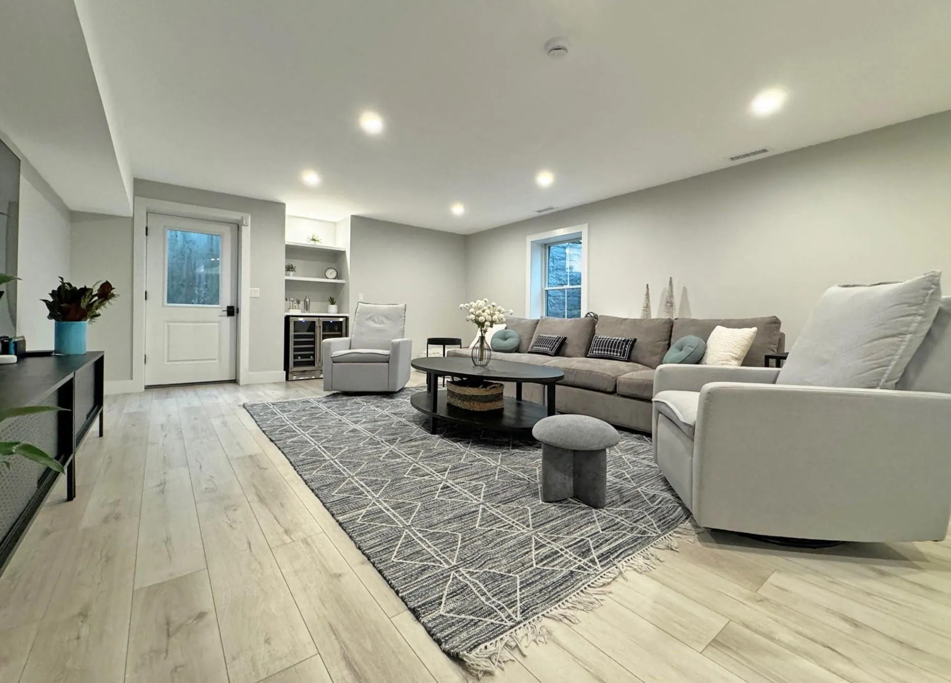 Living room featuring hardwood / wood-style flooring Living room featuring hardwood / wood-style flooring