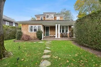 View of front of property with a front yard