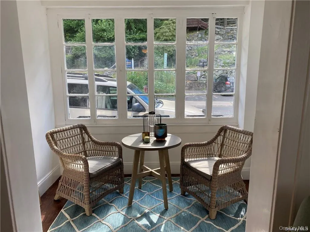 Living area featuring plenty of natural light Living area featuring plenty of natural light
